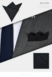 Black wool pocket square for men suit, elegant suit handkerchief suit accessory detail.