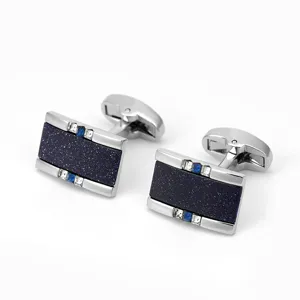 Boutons de manchette élégants pour hommes en métal avec grès bleu et détails en cristal étincelants.