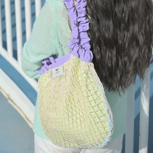 Dopamine style mesh shoulder bag with purple ruffled straps and cute plaid inner lining.