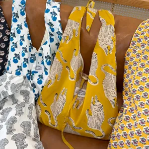 Casual floral and animal print canvas shoulder tote bag with knotted strap, large capacity.