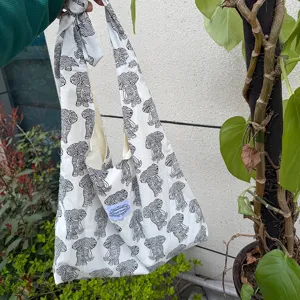 Canvas hobo shoulder bag with black elephant pattern, casual daily knot strap handbag.