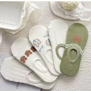 Women summer thin white invisible low cut shallow boat socks with cute cartoon embroidery details.