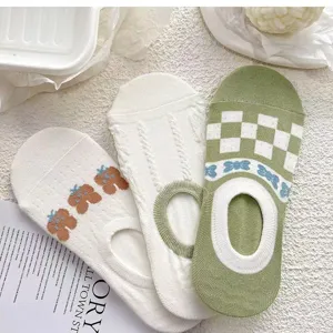 Close-up detail of women's summer thin invisible boat socks featuring knit patterns and bear designs.