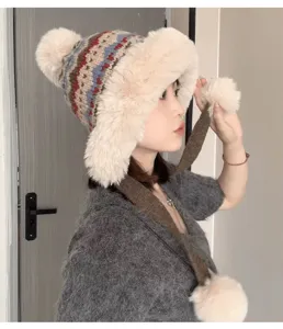 Thickened winter warm plush ushanka hat with ear flaps and cute pom-pom design for women.