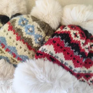 Cozy winter knitted beanie hat with plush pom pom, thick warm cable knit cap for women.