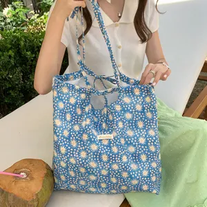Borsa shopper in tessuto blu con motivo floreale e fiocchi, grande borsa casual donna.