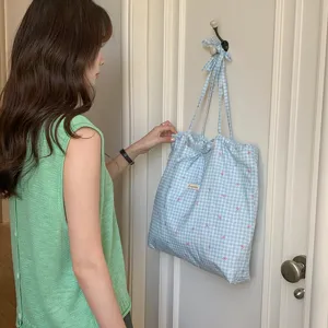 Borsa a tracolla a quadri blu con dettaglio fiocco, elegante borsa casual per uso quotidiano.