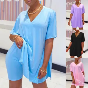 Detail view of the casual V-neck batwing sleeve split top and shorts set in various colors.