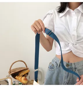 Canvas shoulder bag adjustable strap detail view, casual daily style, durable fabric design.