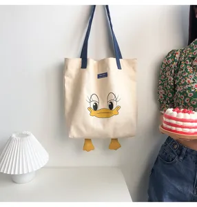 Canvas tote bag with cute cartoon duck print, casual shoulder bag for daily use.