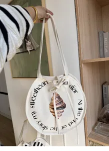 Lässige literarische Canvas-Tasche mit Croissant-Muster und englischem Text, modische Schultertasche.