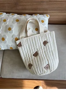 Quilted canvas tote bag with cute brown bear embroidery, casual daily handbag.