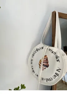 Lässige runde Canvas Tote Tasche für Damen, literarischer Buchstaben Print Schultertasche.