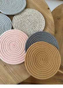 Nordic style woven cotton coaster, thick heat insulation pad for hot bowls and cups on dining tables.