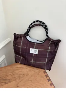 Casual plaid cotton canvas tote bag with stylish rope handles and front quote label for daily use.