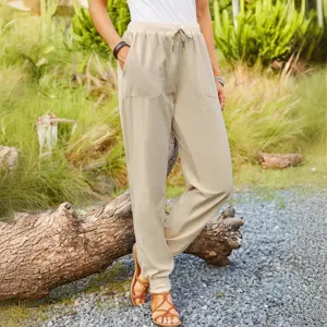 Women's cotton linen casual trousers with elastic drawstring waist and pockets for summer wear.