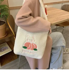 Fluffy tote bag with cute bear and peach embroidery, cozy canvas shoulder bag for women.