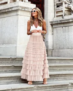Detailed view of a chic tiered tulle maxi skirt with layered ruffles for a stylish summer look.