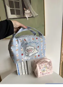 Detailansicht der süßen isolierten Lunchtasche mit Cartoon-Druck für den Büroalltag.