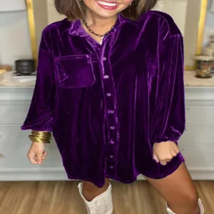 Purple velvet oversized shirt dress detail showing fabric texture, loose fit and button front.