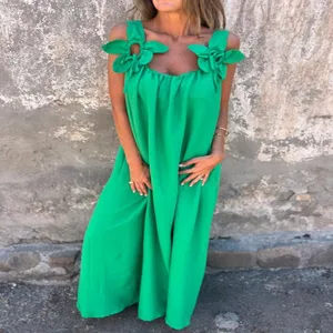 Women summer solid color long dress with chic floral strap design for daily wear fashion.