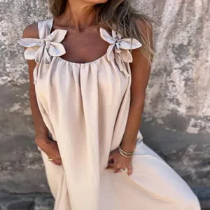 Summer casual solid color sleeveless women dress with cute shoulder bow strap design details.