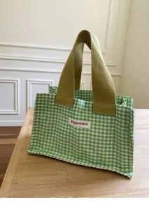 Green gingham canvas tote bag detail, small mini handbag with sturdy khaki handles for daily use.