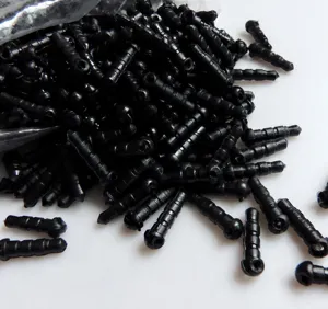 Black silicone dust plug detail shot, suitable for phone earphone jack protection.