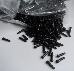Black silicone anti-dust plugs bulk pack for mobile phone charging port dust protection.