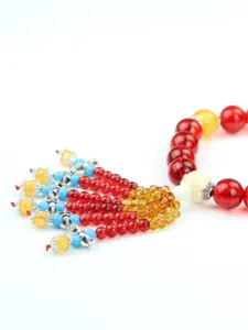 Car hanging crystal bead ornament prayer beads red and yellow tassel interior decoration detail