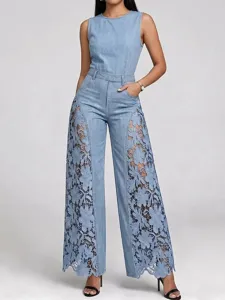 Detail view of the stylish light blue sleeveless denim jumpsuit featuring intricate side lace cutouts.