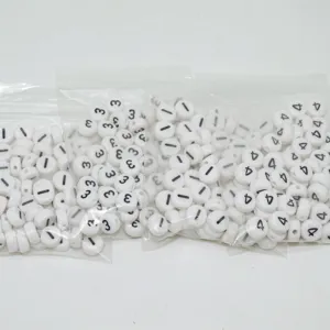White acrylic number beads detail shot, perfect for DIY jewelry making and bracelets.