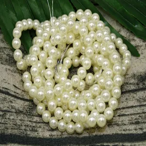 ABS imitation pearl beads detail shot, smooth round drilled pearls for DIY crafts and decor.