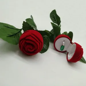Velvet rose ring box with stem and green leaves, perfect romantic gift box for jewelry storage.