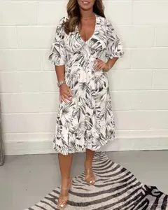 Robe midi d'été à fleurs et col en V pour femmes, imprimé de feuilles tropicales décontracté.