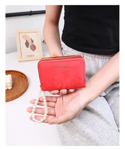 Porte-cartes en suède pour femmes avec bracelet en perles élégant, petit portefeuille zippé.