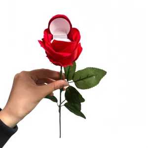 Flocked rose ring box with stem for romantic proposal and jewelry gift storage display.