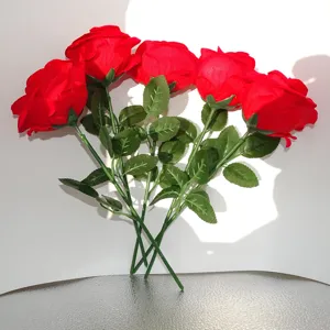 Artificial red rose flower detail shot, perfect for romantic decoration and gift presentation.