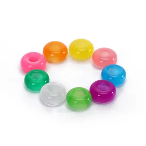 Colorful resin donut beads detail shot, smooth finish DIY jewelry accessories for bracelets.