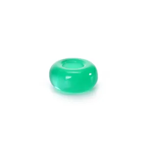 Green resin barrel bead detail showing smooth surface and center hole for DIY jewelry making.