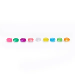 Close-up of colorful resin barrel beads detail, perfect for DIY jewelry making and crafting.