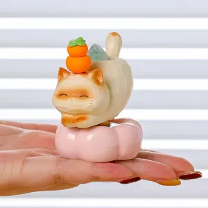 Cute lucky cat desktop ornament, resin miniature cat figurine with swivel base for office.
