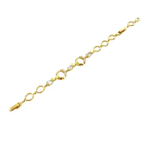Brazalete geométrico de circón chapado en oro 18K con delicados eslabones de cristal mujer.