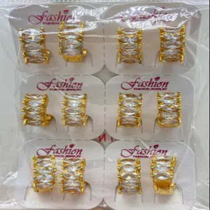 Wholesale gold plated marquise cubic zirconia hoop earrings set on display cards for chic style.