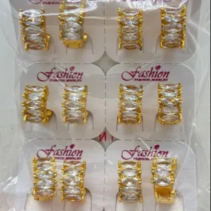 Gold plated hoop earrings with sparkling marquise cut cubic zirconia stones, elegant design.