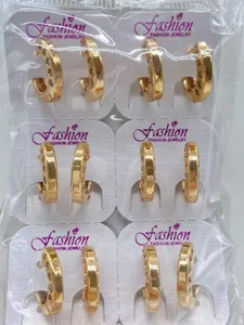 Großhandel goldene Creolen Ohrringe Set mit funkelnden Zirkonia Steinen für Damen und Mädchen.