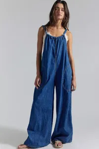 Casual loose blue denim jumpsuit with straps, comfortable wide leg design for daily wear.