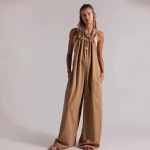 Khaki loose jumpsuit detail showing wide leg fit, comfortable fabric and utility pockets.