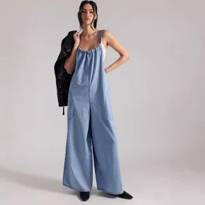 Detailed view of casual wide-leg denim jumpsuit showcasing soft fabric texture and relaxed fit.