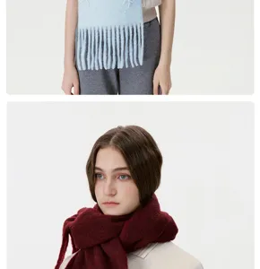 Nahaufnahme Detailansicht Damen Winter warmer flauschiger Schal mit Perlen Schleifen Fransen.